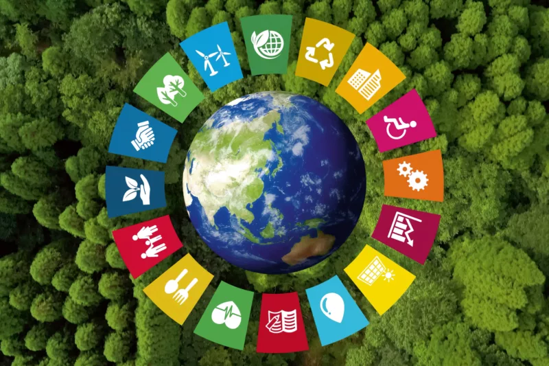Die Erde vor grünem Hintergrund umringt von den SGD-Icons der Agenda 20230
